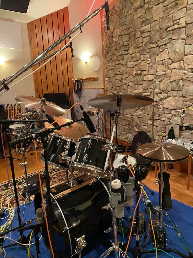 A full drum set, in the studio